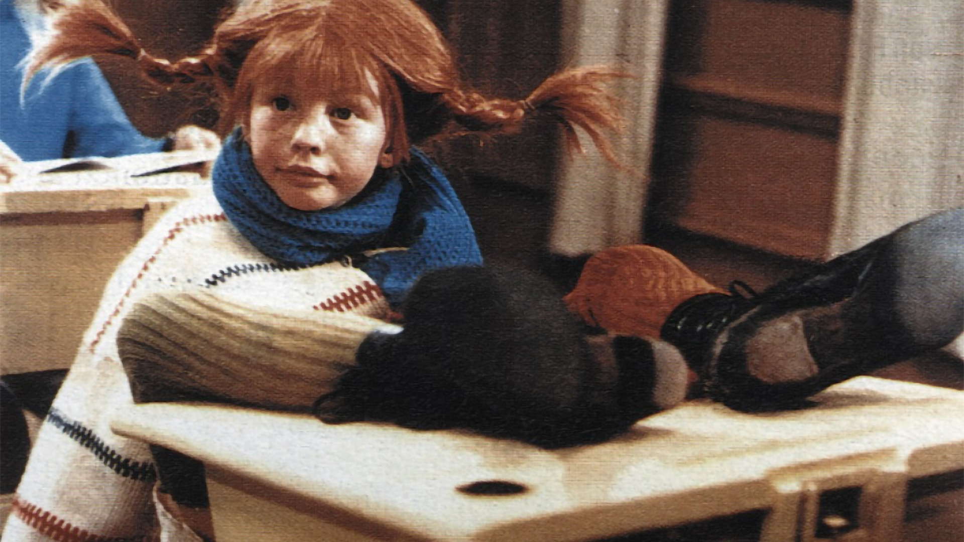 Pippi Langstrumpf in der Schule. Filmstill aus Pippi geht von Bord (1969).